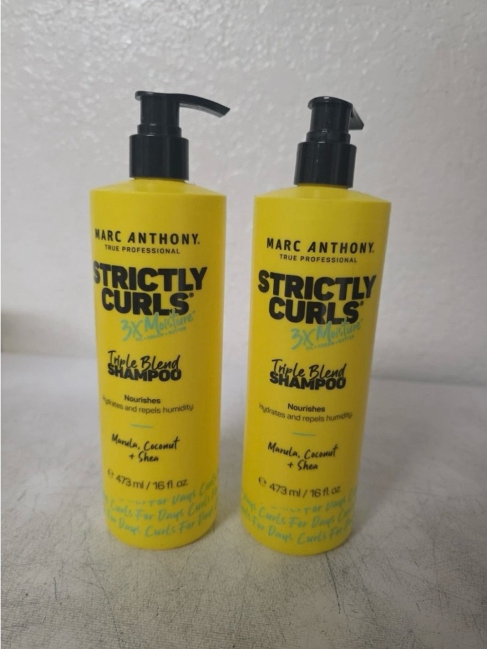 Buy one get one 50% 
off Marc Anthony Yellow Curl Care Pump Bottle